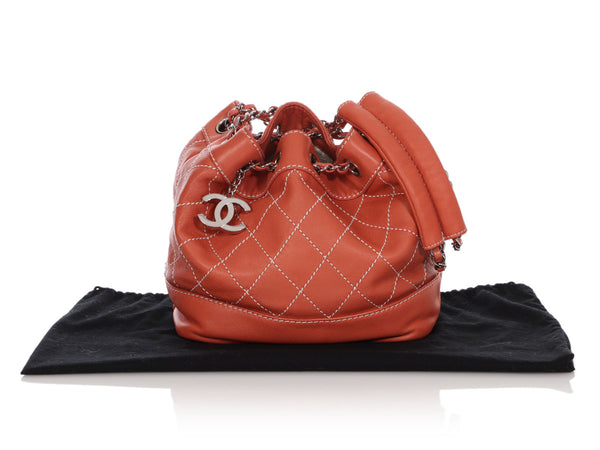 Chanel Small Coral Lambskin Surpiqué Drawstring Bucket Bag - Ann's Fabulous  Closeouts