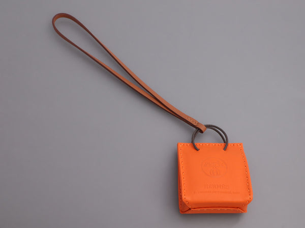 HERMES Orange Shopping Bag Charm Feu/ Gold *New