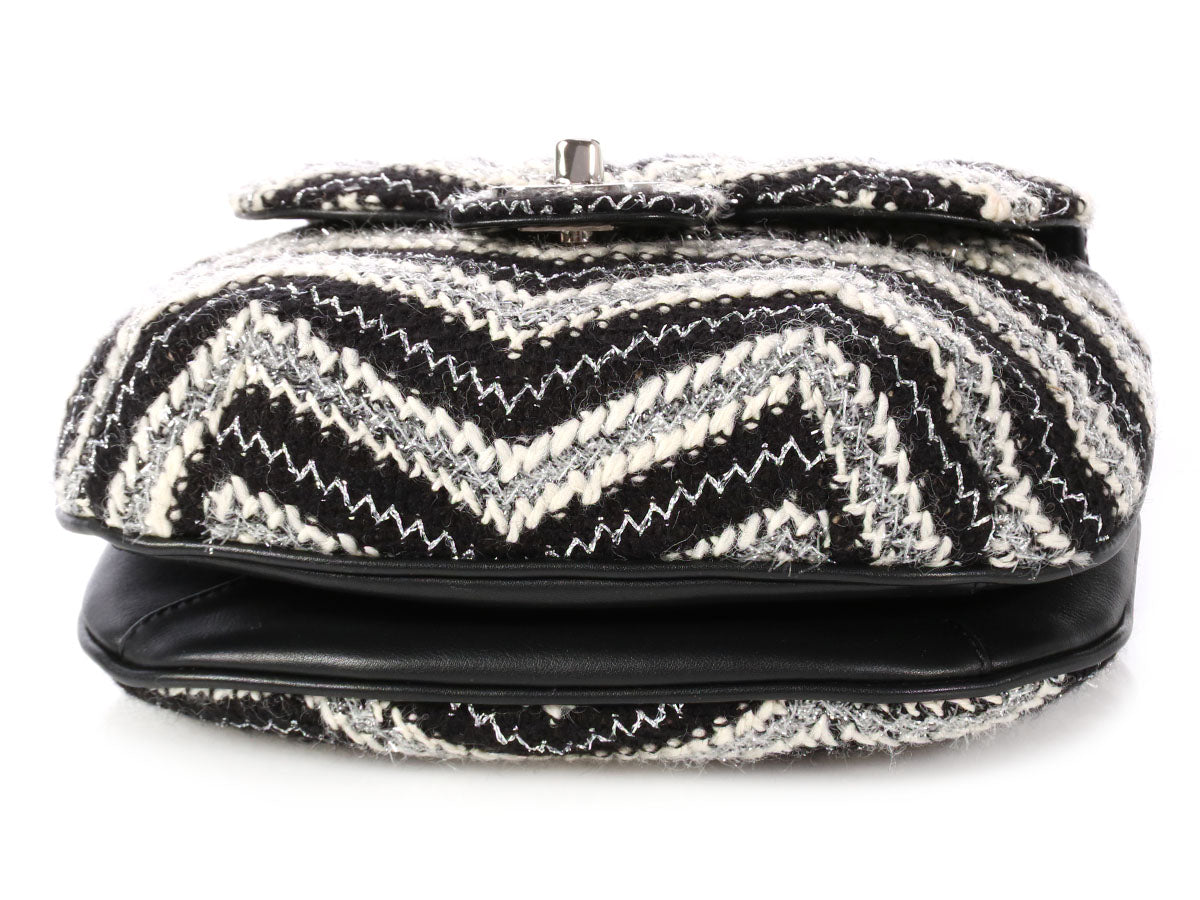 white and silver chanel bag black