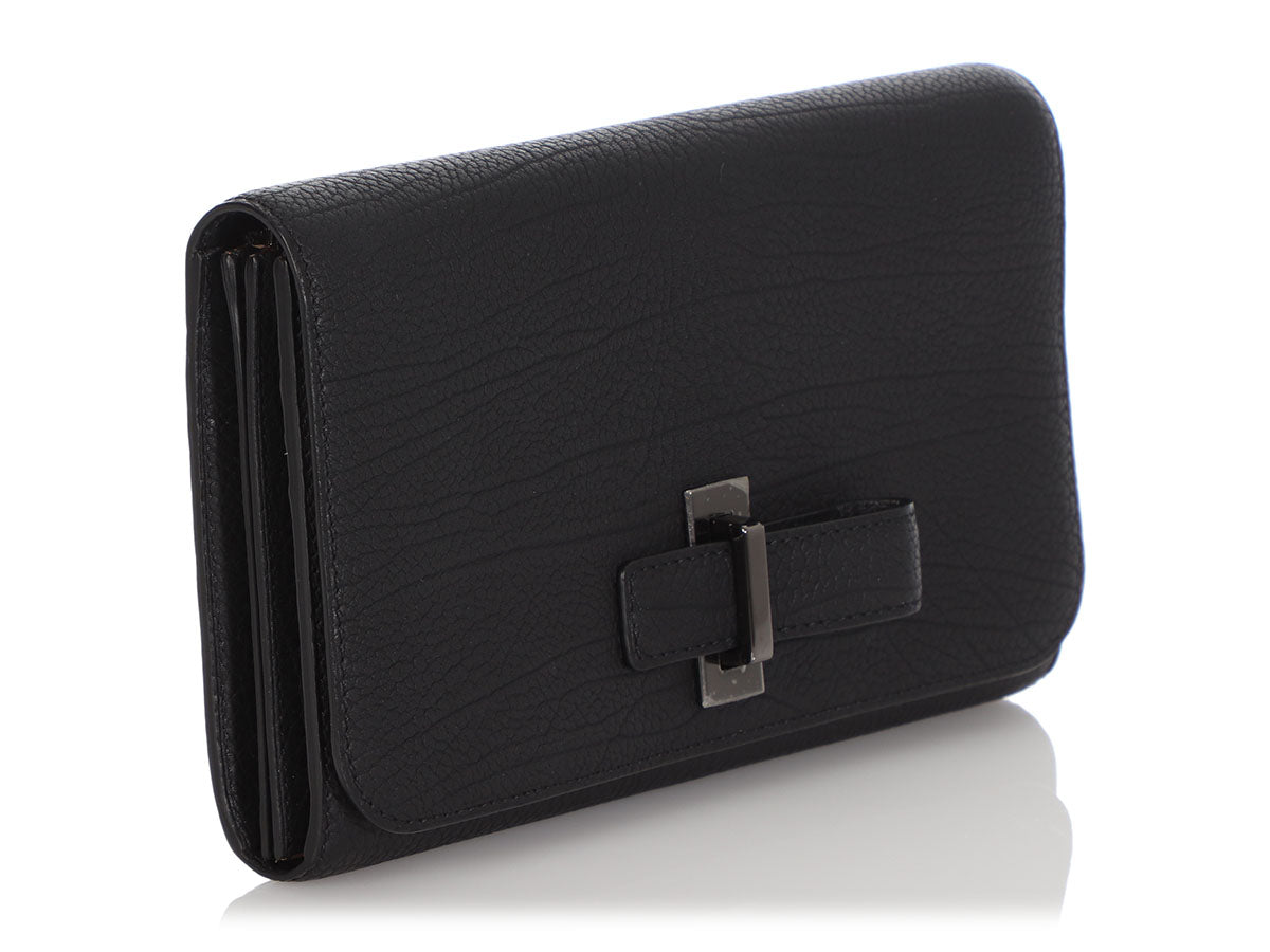Sold at Auction: Delvaux Simplissime travel wallet shades camaïeux with  matching storage bag