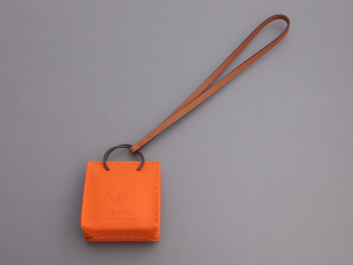 Authentic NEW Hermes Orange shopping bag leather charm