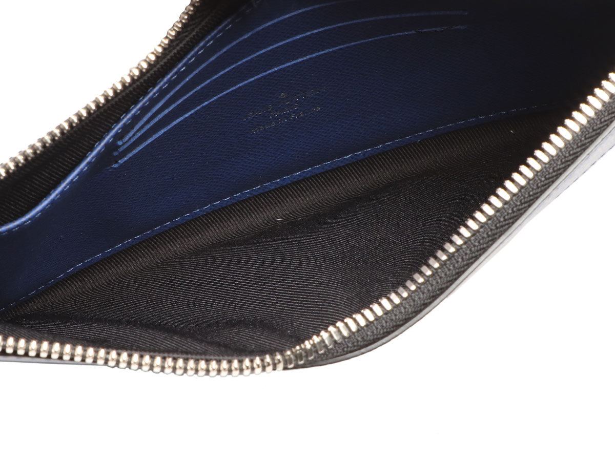 Louis Vuitton Blue Taigarama Pochette Discovery PM - Ann's Fabulous  Closeouts