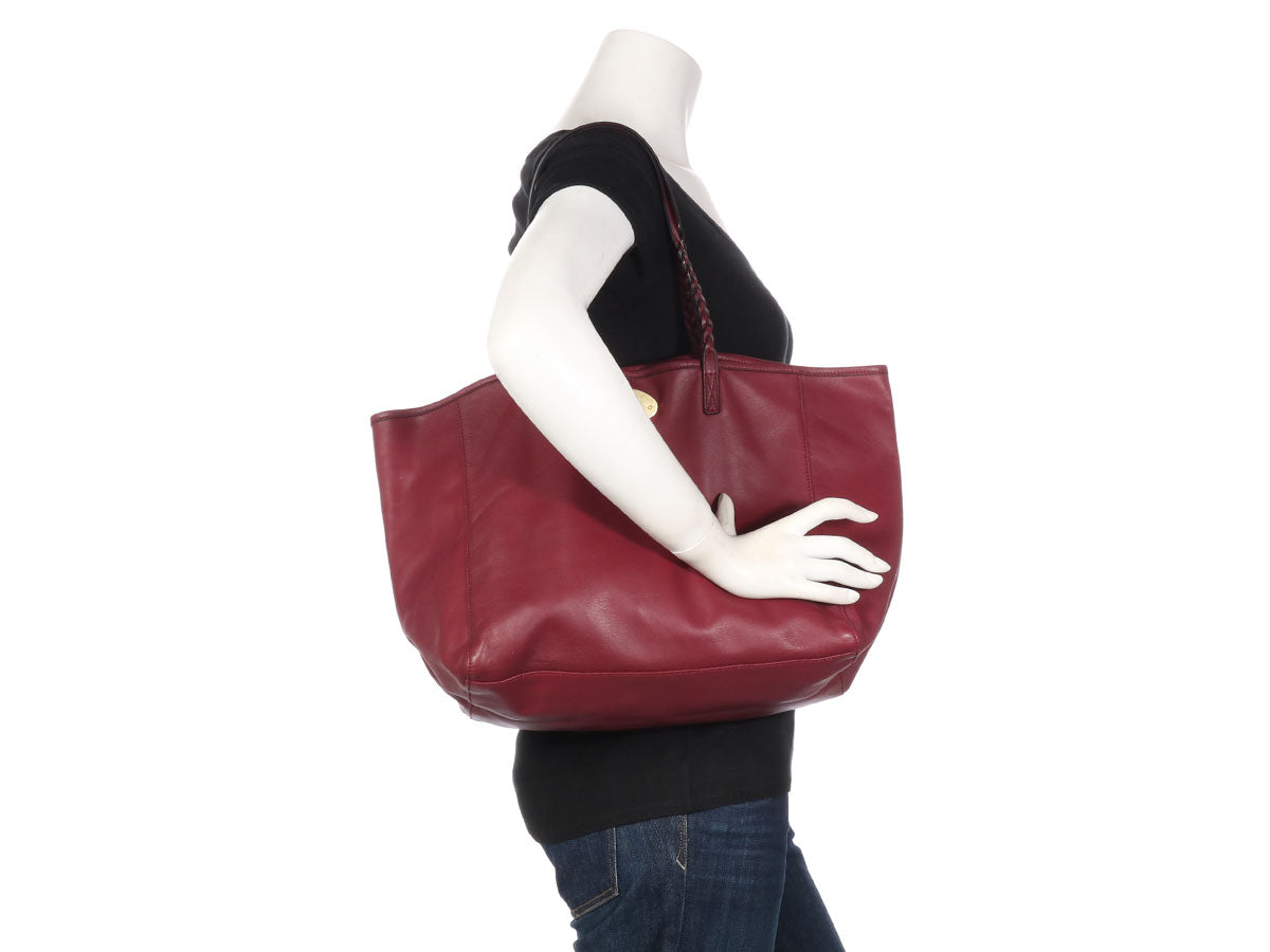 Women's burgundy shopper bag in braided leather