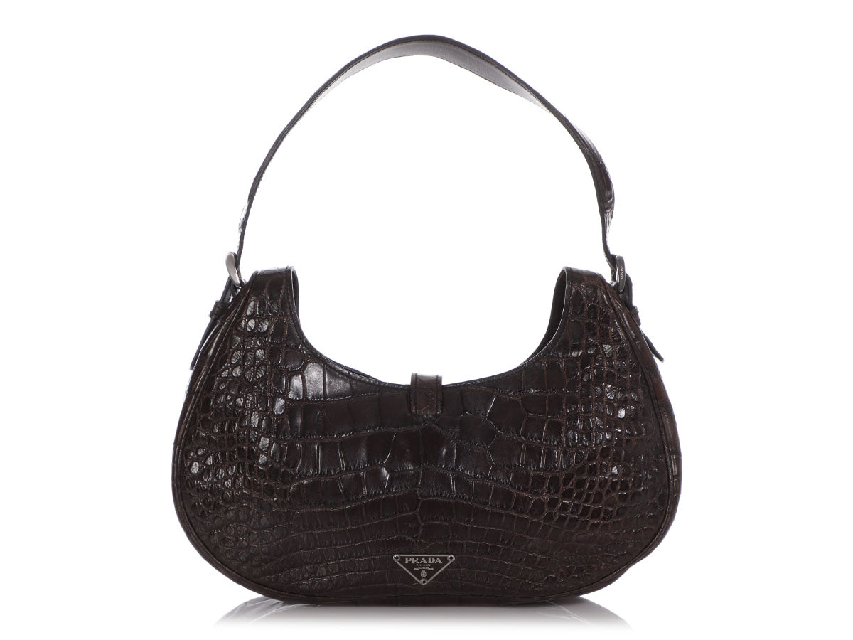 PRADA brown crocodile-printed leather bag. Cm 24.5x37x13…